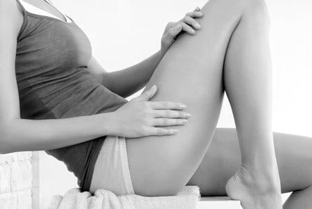 Woman applying Eucerin product on her hand